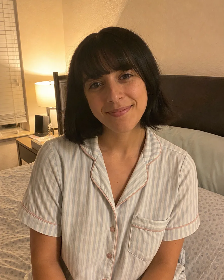 Jet-black bob, blunt fringe