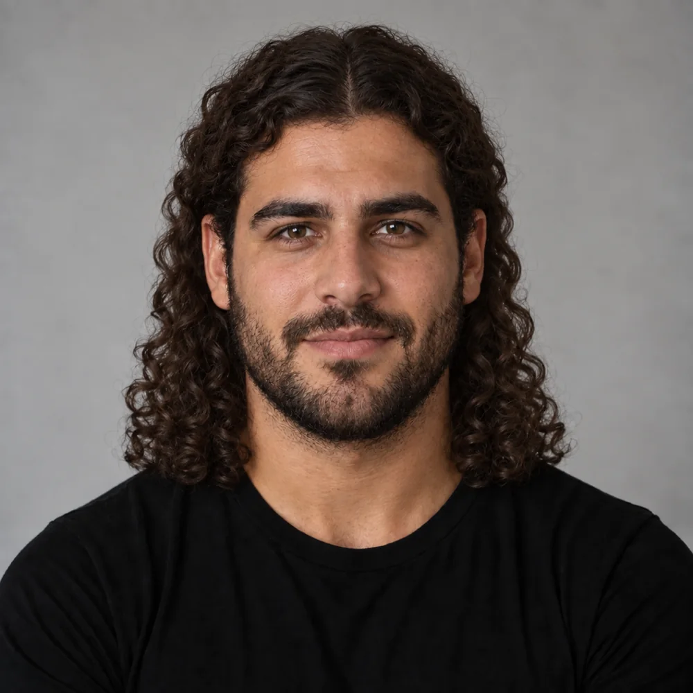 Elias with a shoulder-length centre part