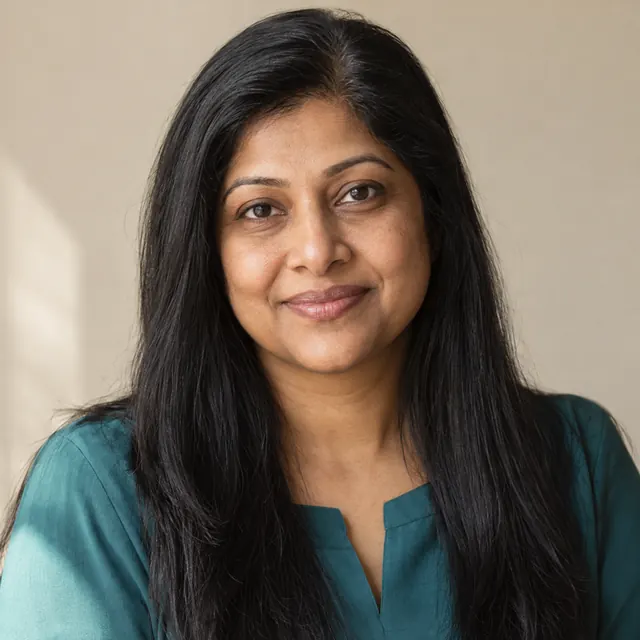 A woman in her forties with long, straight black hair, before, with their current hair